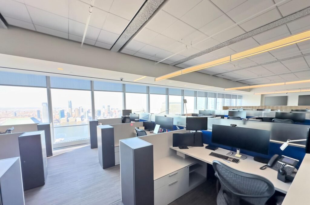 Contemporary office interior with modern workspace setup and elegant furniture.
