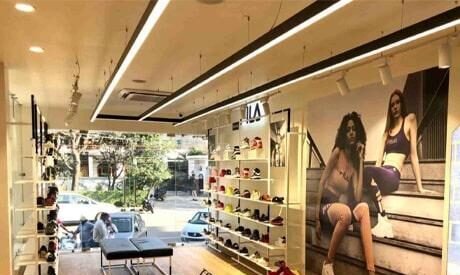 Modern retail showroom with stylish product displays.